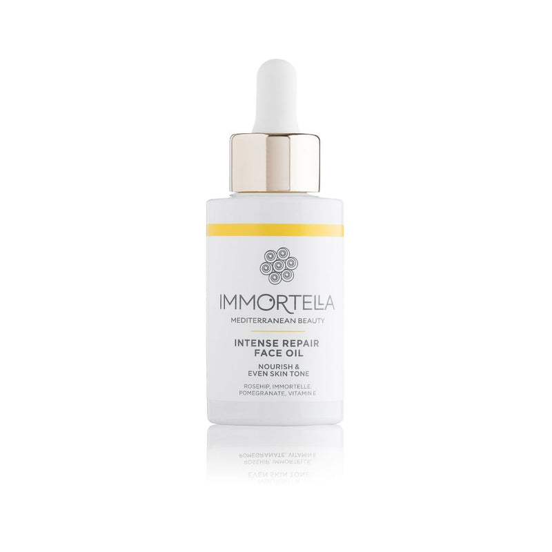 Immortelle facial oil in glass bottle. Natural anti-ageing facial treatment combines five carefully selected plant oils, enriched with organic essential immortelle oil.